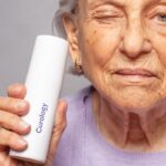 woman holding Curology bottle